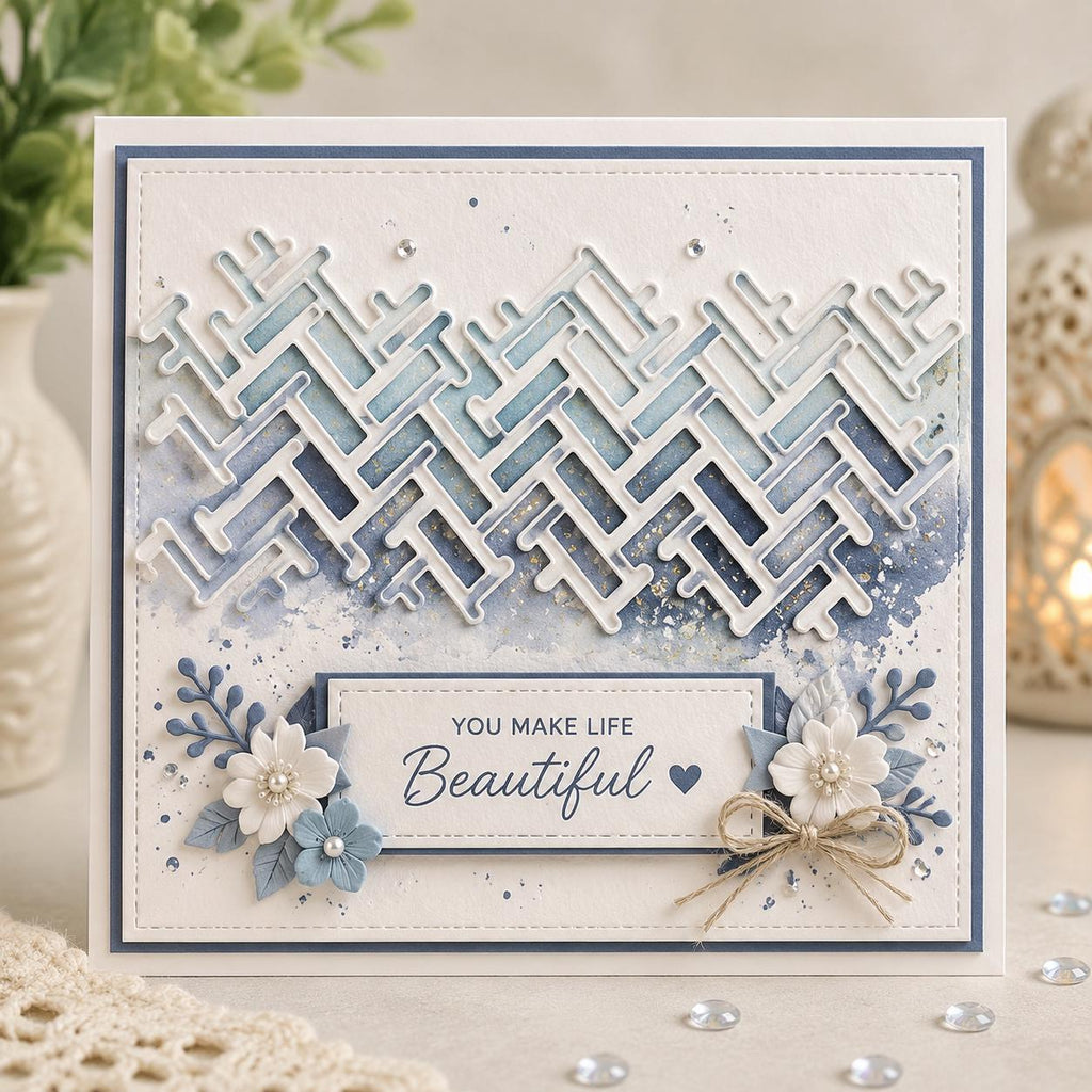 Blue greeting card with layered geometric brick pattern, white flowers, and beautiful sentiment
