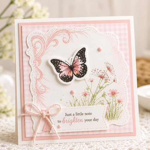 Pink card with butterfly stamp, wildflower meadow, and brighten your day greeting