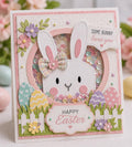 Easter shaker card with white bunny head, pastel eggs, flowers, and Happy Easter greeting