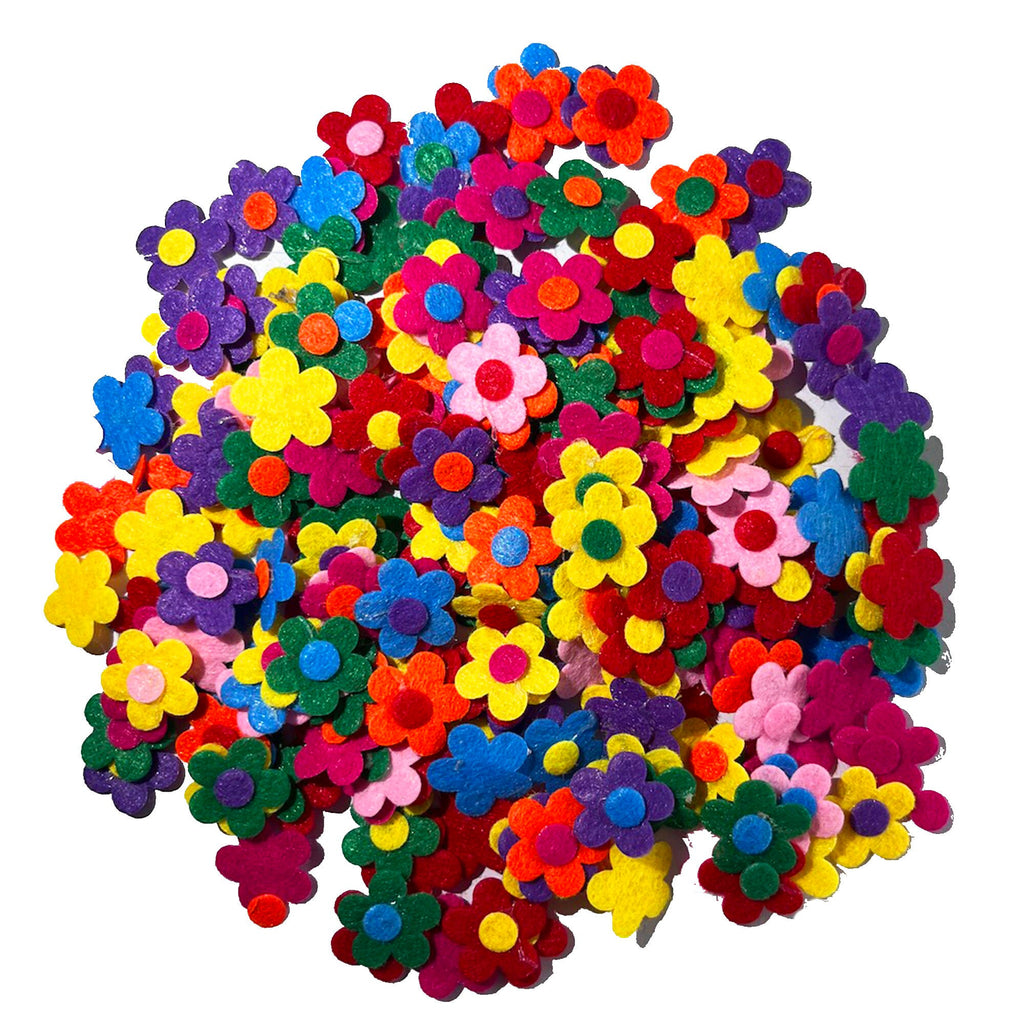 A large pile of colorful felt flower embellishments. The flowers are in various shades of red, orange, yellow, green, blue, purple, and pink.