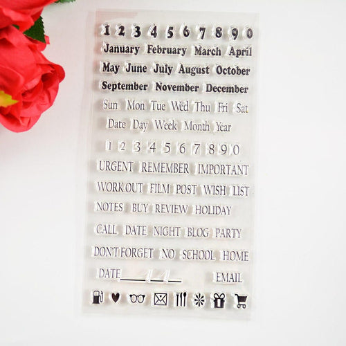 Clear planner stamp sheet with months, dates, weekdays, reminders, and icons