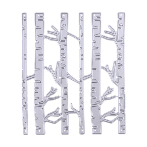 Silver metal cutting dies shaped like tall birch trees and branches
