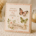 Butterfly birthday card with two colored butterflies and curled banner greeting
