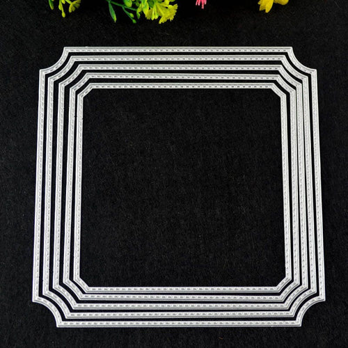 Five nested rounded-corner rectangular metal cutting dies on black background