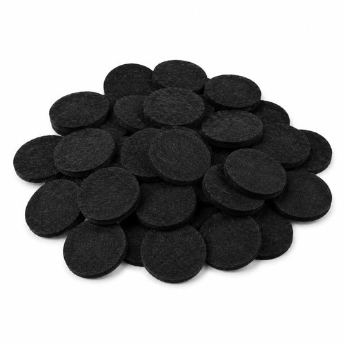 Pile of black felt circles shown against a white background